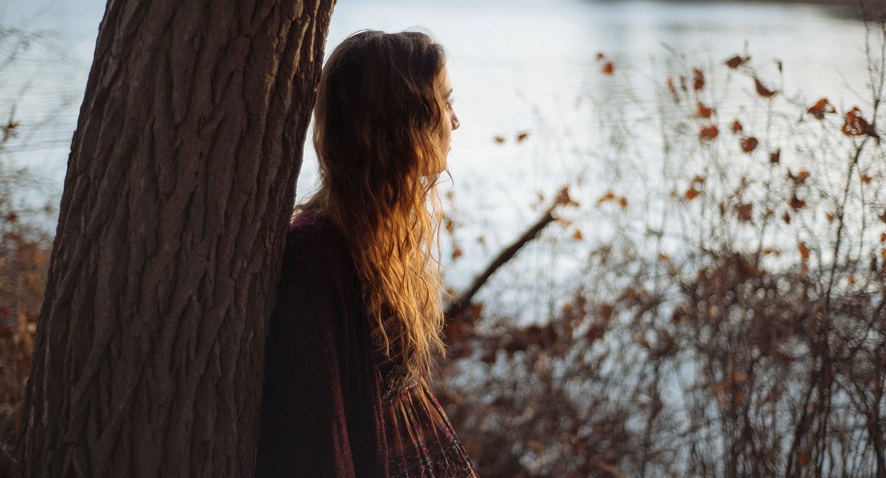 woman and tree listening to body