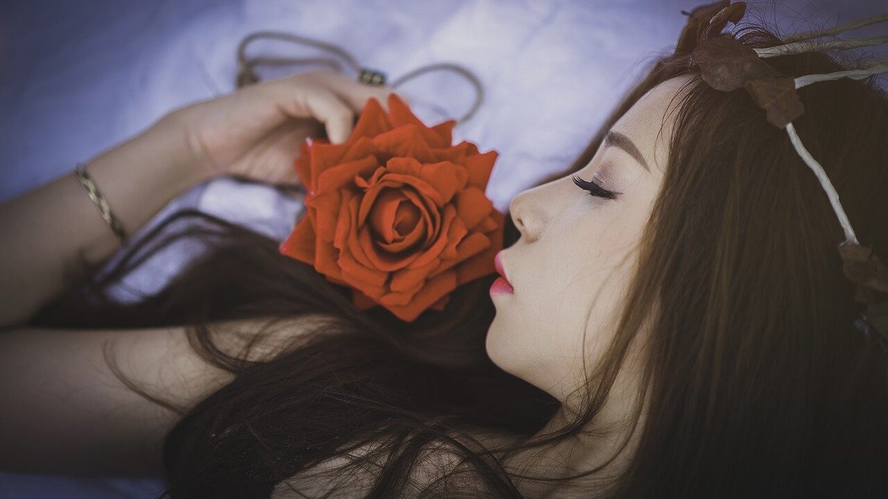 woman surrendering to the peace of rest